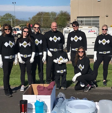 Powertex Rangers dressing up and hosting the Eau Claire Marathon Water Station