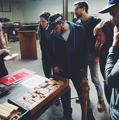 Powertex Creative team enjoying a tour of the Hamilton Wood Type Museum