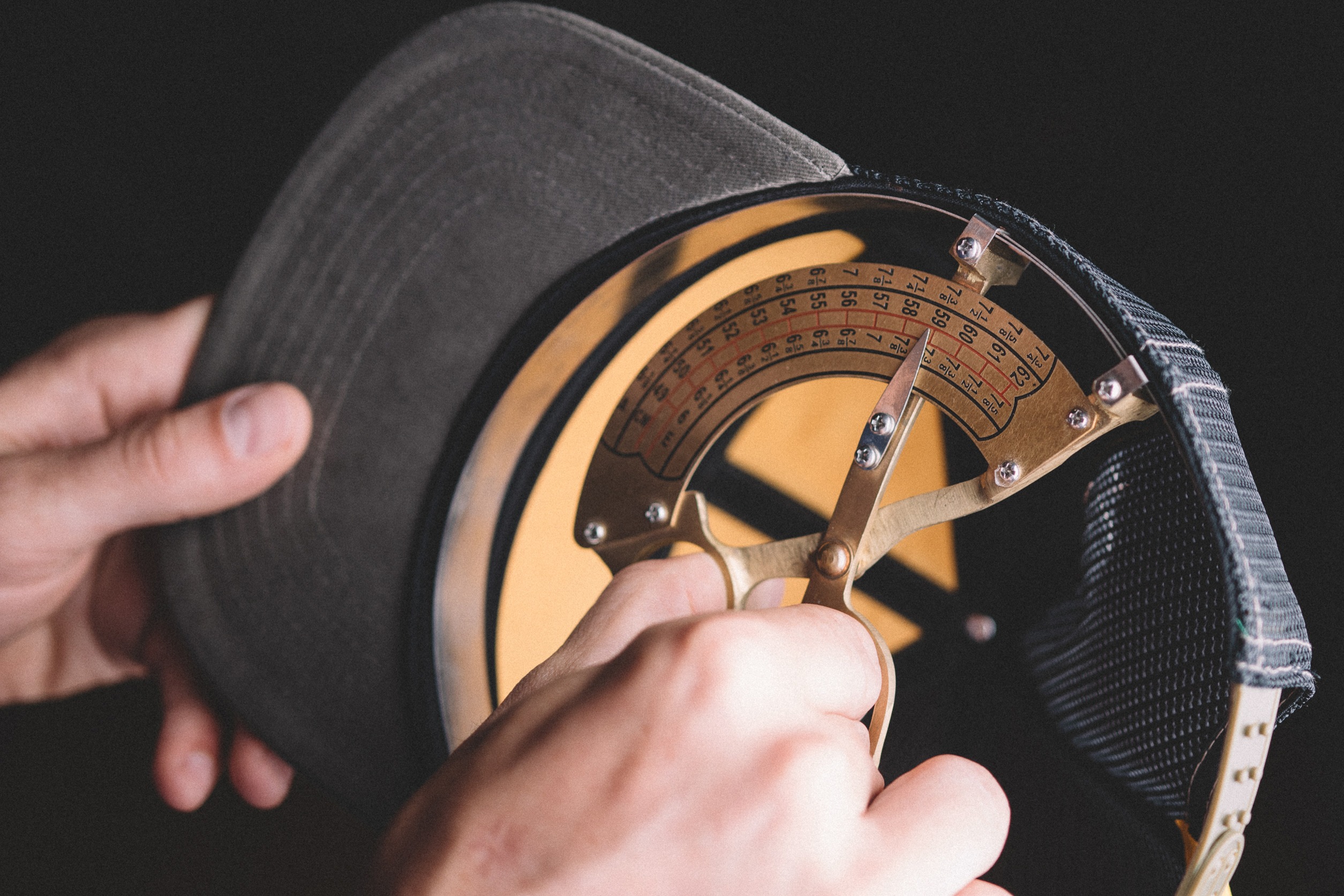 Hat being inspected for quality in our factory.