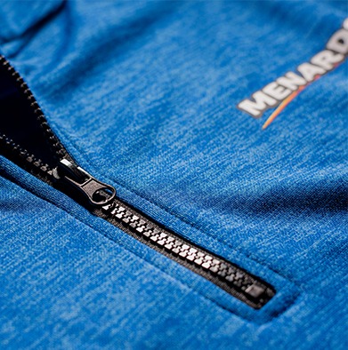 Zipper pull customization close up on Menards uniform