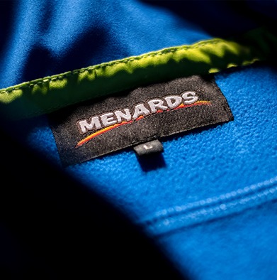 Close up of Menards uniform private labeling