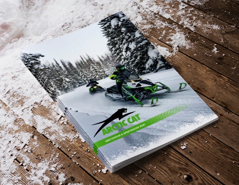 Arctic Cat Gear Product Catalog on snowy boards.